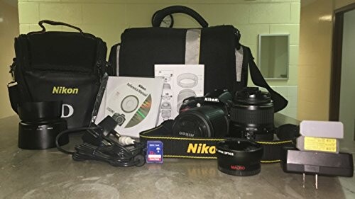 Nikon camera set with accessories including lens, bag, CD, and charger