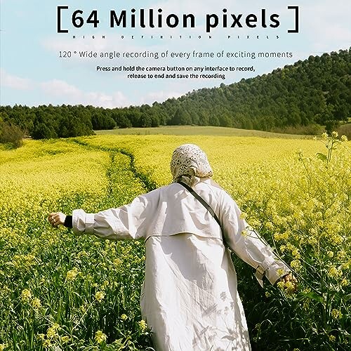 Woman in white walking through a yellow flower field.